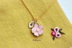 Super cute Cherry blossom necklace in gold ▶▶ You can make this necklace personal choosing the initial from option. You can add more initials from following link. https://www.etsy.com/listing/188788608/personalized-initial-leaf-charms-for?ref=shop_home_active_1&pro=1 ▶ Material - Gold plated over brass, pearl ▶ Chain Length - 14~ 20 inches (adjustable chain. please choose desired length from option) ▶ Pendant measure - H. 14mm x W. 13mm ▶The matching earrings available from following link. h Sakura Necklace, Pink Flower Wedding, Cute Cherry Blossom, Cherry Blossom Necklace, Flower Girl Necklace, Blossom Bracelet, Necklace Everyday, Girl Necklace, Pearl Necklace Wedding