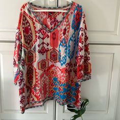 So Light And Flowing. Beautiful Vibrant Colors. 3/4 Sleeves. V-Neck. Make An Offer! Combine Into A Bundle For Savings On Shipping! Vibrant Print V-neck Tunic, Bohemian Half Sleeve Blouse For Beach, Bohemian Half Sleeve Beach Blouse, Multicolor Half Sleeve Tops For Beach, Vibrant V-neck Blouse For Beach, Bohemian 3/4 Sleeve Summer Blouse, Bohemian Half Sleeve Blouse For Vacation, Bohemian Blouse With 3/4 Sleeves For Summer, Summer V-neck Tunic With Vibrant Print