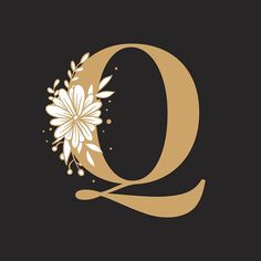 the letter q is decorated with flowers and leaves in gold on a black background,