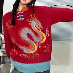 Elevate your style with our Chinese Style Dragon Sweater. This luxurious piece features intricate dragon embroidery, inspired by traditional Chinese designs. Made with premium materials, this sweater combines elegance and comfort. Make a statement and stand out in this exclusive and sophisticated sweater. Features: -40% Acrylic,30Polyester.30Cotton -Crew Neckline -Contrast -Dragon -Super Soft Fabric -Regular fit -Classic Style Traditional Long Sleeve Winter Tops, Traditional Long Sleeve Tops For Winter, Traditional Long Sleeve Winter Sweater, Dragon Sweater, Dragon Super, Dragon Embroidery, Chinese Design, Red S, Free Socks