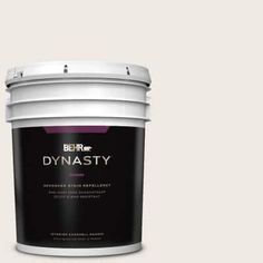 a white paint bucket with the words dynaasty on it's side