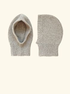 a knitted hat and mitten on a white background