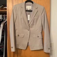 Brand New! No Issues, Just Downsizing Closet. Tag Size Is 6 But Fits More Like A 4- Could Definitely Fit A 6 As Well But Will Be More Snug. (Note That There Is Only One Jacket, Size 6, But Listed Both Sizes Since It Could Go Either Way!) Beige Button-up Blazer With Snap Buttons, Neutral Button-up Blazer For Work, Neutral Blazer With Buttons For Work, Neutral Blazer With Button Closure For Business Casual, Neutral Business Blazer With Button Closure, Fitted Beige Button-up Blazer, Fitted Neutral Blazer For Office, Fitted Single Breasted Neutral Blazer, Elegant Beige Blazer With Snap Buttons