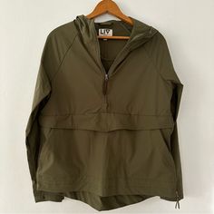 Liv Outdoor Olive Green Anorak With Front Hand Pocket Nwot Khaki Raincoat For Hiking In Fall, Green Utility Windbreaker For Fall, Casual Half-zip Outerwear For Outdoor Activities, Spring Khaki Hiking Outerwear, Khaki Outerwear For Hiking In Spring, Khaki Outerwear For Spring Hiking, Casual Olive Outerwear For Outdoor Activities, Utility Windbreaker For Hiking In Fall, Fall Hiking Utility Windbreaker