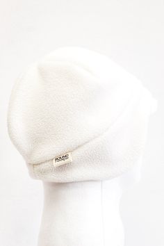 "Anti-Pill Earmuff Beanie Fleece Newsboy Hat for Women Winter White Ear coverage 1-2 weeks processing times for any order This beautiful winter white anti-pill fleece beanie is sure to keep you toast this winter. It's a great grab and go hat when you're running to the bank, picking up kids, or getting that perfect shot when the weather is prime! This anti-pill oh-so-warm winter hat is sure to keep you stylishly cozy no matter the occasion. It's winter white fleece color is a great coordinate tha Soft Adjustable Winter Bonnet, White Outdoor Beanie Cap, White Adjustable Beanie For Cold Weather, White Brimmed Beanie For Winter, Adjustable Soft White Beanie, White Bonnet For Cold Weather, Warm White Bonnet For Cold Weather, Warm White Beanie For Outdoor, Soft Adjustable White Bonnet