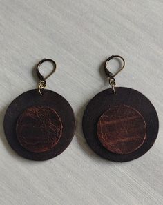 Everyday Brown Jewelry With Waxed Finish, Everyday Hand-tooled Leather Jewelry, Everyday Hand Tooled Leather Jewelry, Brown Leather Jewelry With Soldered Details, Adjustable Brown Faux Leather Jewelry, Everyday Brown Faux Leather Jewelry, Brown Leather Round Jewelry, Handmade Faux Leather Dangle Jewelry, Brown Leather Jewelry