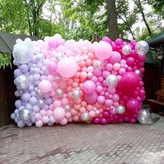 a bunch of balloons that are on the ground