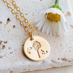 Make a wish and let it soar with our Dandelion Charm Necklace, featuring a delicate dandelion charm floating on the breeze, symbolizing hope, resilience, and the power of dreams. * Charm Size: 1/2-inch (13 mm) * Chain Length: 18″ default * Material: 14K Gold-Filled (USA sourced) * Method: Hand-stamped with traditional metal punching * Origin: Made in Pacifica, USA>> [ What is 14K Gold-Filled? ] 14K gold-filled jewelry offers a beautiful, durable, and affordable alternative to solid gold. Unlike Unique Gifts For Her, Jewelry Unique, Gold Filled Jewelry, Personalized Jewelry, Hand Stamped, Halloween Shopping, Charm Necklace, Dandelion, Necklace Etsy