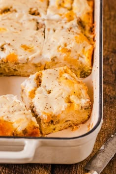 a casserole dish filled with meat and cheese