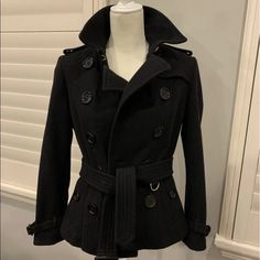 The Perfect Holiday Jacket Fits Like A Us 6/8 Guaranteed Authentic Ladies Burberry Black Peacoat Daylesmoore Wool Blend Size 44 It Pair This Stylish & Sophisticated Pea Coat With Jeans And A Pointed Toe Heel Or Dress It Up With A Fitted Maxi Skirt And Heels. Sophisticated ~ Classy ~ Distinctively Burberry! Sizing Context: 44 It (10 Us) Runs Small And (In My Opinion Is More Of A Size 6/8 Us Given Burberry Fit). 44 It/10 Us Stunning & Beautiful. Never Worn But Hung In Closet No Flaws. Wool Can Pic Designer Black Long Sleeve Wool Coat, Designer Black Double-breasted Pea Coat, Designer Black Wool Pea Coat, Designer Double-breasted Winter Outerwear, Designer Double-breasted Pea Coat For Fall, Designer Double-breasted Fall Peacoat, Designer Long Sleeve Pea Coat For Winter, Fitted Black Double-breasted Peacoat, Elegant Black Peacoat For Workwear