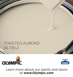 a white paint can being poured onto the floor with an olympic logo above it that reads misty meadow ollb888 learn more about our paints and stains at www olympic com