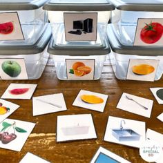 there are many pictures on the table with fruits and vegetables in them, including oranges