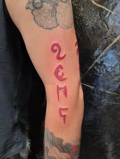 a man with a tattoo on his arm that says 2013 and has the number twenty seven