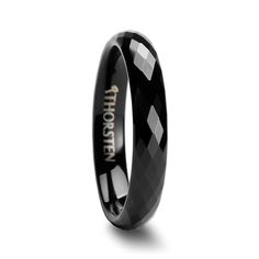 black ceramic ring with the words thorsten on it