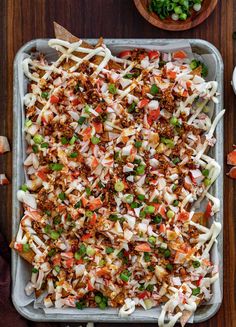 a casserole dish with meat and vegetables in it