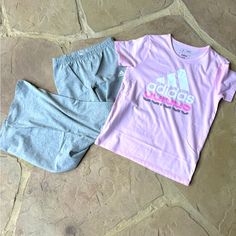 Nwt Adidas, 2-Piece Set, Shirt & Flare Pants, Size M 10/12 Colors: Pink & Gray Pink, Short Sleeve, Shirt Has “Adidas” Design On Front In White, Pink & Gray. Pants Are Gray, Elastic Waistband, Has Adidas Logo On Front In White. Content: Top: 56% Cotton | 44% Polyester Bottom: 95% Cotton | 5% Elastane Retail $19.97 Casual Stretch Sets For Playwear, Sporty Pink Loungewear Sets, Pink Casual Stretch Sets, Casual Stretch Pink Sets, Stretch Pink Cotton Sets, Pink Stretch Cotton Sets, Pink Stretch Short Sleeve Sets, Casual Adidas Sets For Spring, Adidas Pink Playwear Sets