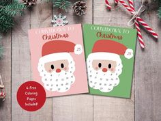 two christmas calendars with santa claus on them and candy canes next to them