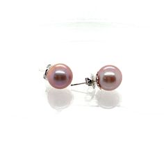 Purple Edison Pearl Stud Earrings  Large and Lustrous, 11mm, Edison Pearl, Mauve Earrings  Reflective and Very Clean Nacre Surfaces, with Gold Overtones These highly coved pearl earrings feature big, bold and beautiful Edison pearls and sterling silver stud settings. And the price is right!! High Luster Silver Round Earrings, Classic Pink Round Earrings, Elegant Purple Pearl Earrings, Big Pearl Studs, Pearl Purple Earrings, Purple Dangle Pearl Drop Earrings, Pink Pearl Earrings Studs, Mauve Earrings, Edison Pearls