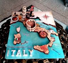 there is a map on the table that says italy