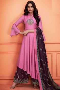 A stylish interpretation of ethnic glamour and contemporary style, this Rose Pink Cotton Anarkali with Palazzo which will surely grabs everyone attention. This Collar v neck and Quarter Sleeves Wedding Wear Dress perfectly formed using resham, zari and stone work. Pink Anarkali Suits, Partywear Suits, Plazzo Suits, Pink Anarkali, Silk Rose, Party Wear Lehenga