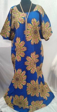 A bold handmade Ankara boubou, also known as a kaftan, long dress, maxi dress or even a boubou gown. Whatever you decide to call it the free flowing floor length dress will definitely have heads turning.  This dress is a one size fits all (from size 10- 24). Please feel free to contact me if you have any questions. Fitted Blue Ankara Maxi Dress, Multicolor Dresses With Traditional Patterns For Summer, Multicolor Summer Dresses With Traditional Patterns, Traditional Fitted Kaftan With Short Sleeves, Fitted Multicolor Kaftan With Traditional Patterns, Fitted Multicolor Short Sleeve Kaftan, Fitted Dress With Traditional Patterns And Short Sleeves, Blue Long Sleeve Ankara Dress, Fitted Yellow Dress With Traditional Patterns