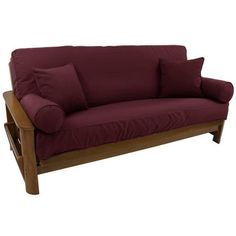 a futon couch with two pillows on it's back and one arm extended