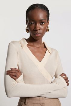 Premium Tencel Jersey Collared Long Sleeve Top Elegant Foldover Top For Fall, Off White Tops For Layering In Fall, Off White Tops For Fall Layering, Classic Neutral Tops For Layering, Cream V-neck Top For Fall, Cream Long Sleeve Blouse For Layering, Winter Wrap Top, Off White V-neck Top For Fall, Versatile Long Sleeve Beige Top