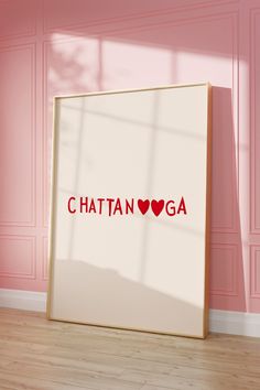 a photo frame with the word chatan yoga on it in front of a pink wall