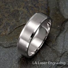 a wedding band that has been made to look like it is in brushed stainless steel