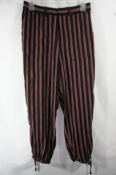 by Anthropologie striped pants - In great condition with some wash wear/fading. Side pockets, cinch ankles with ties, faux back pockets. Size small, see measurements. Approximate measurements taken laid flat, un-stretched: Waist: 14' Inseam: 24" Front rise: 12" From a smoke-free home. Ships to US only. Please read the item description, review all pictures and ask any questions before agreeing to purchase as refunds/returns are not offered. Black Pants With Red Stripe On Side, Tropical Fashion, Casual Joggers, Pj Pants, Red Stripe, Pants Black, Striped Pants, Black Pants, Black Red