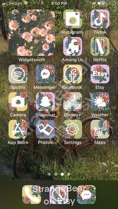 an iphone screen with flowers on it