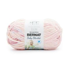 bernat baby blanket yarn in pink and white, on a white background with the label