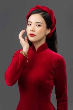 Red TRADITIONAL Velvet Ao Dai  Product information: Material: Red Velvet  The product has a slight stretch Feminine elegant color Exquisite sewing Easy to coordinate with accessories for a complete set This set includes a  Ao Dai and a matching pants. It's Asian size, it may run out 1-2 smaller size than International Standard size. Please refer the size chart before purchasing Please let me know if you need more information! See more beautiful Ao Dai at : https://www.etsy.com/au/your/shops/Ther Traditional Red Winter Dress, Red Long Sleeve Cheongsam For Wedding, Red Long Sleeve Cheongsam For Party, Elegant Red Long Sleeve Ao Dai, Red Long Sleeve Ao Dai For Formal Occasions, Red Fitted Long Sleeve Ao Dai, Ao Dai Red, Bridal Ao Dai, Red Ao Dai