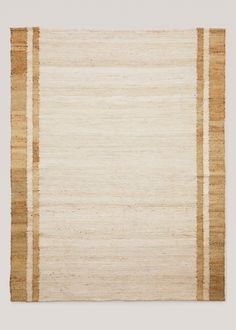 an area rug with beige and tan stripes