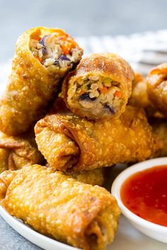 fried food on a plate with dipping sauce