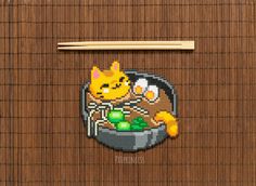 a pixelated image of a cat in a bowl with chopsticks on the side