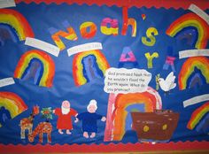 a bulletin board with children's artwork and rainbows on the front, along with words that spell out noah