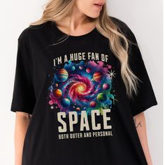 Get ready to blast off into style with our space shirt collection! Whether you're an outer space fanatic or just love cute cosmic designs, our Pluto 'Never Forget' tee is perfect for showing your planetary pride. Explore the universe in comfort with our adorable space-themed t-shirt featuring galaxies, planets, and more. It's the ultimate graphic tee for anyone who dreams of interstellar adventures! PRODUCT DETAILS This classic unisex jersey short sleeve tee fits like a well-loved favorite. Soft Galaxy Planets, Space Shirts, Personal Space, Shirt Collection, Outer Space, Cotton Fiber, Happy Holidays, Planets, Graphic Tee