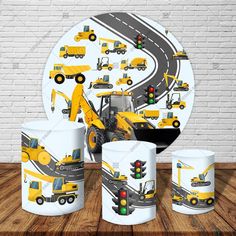 construction themed mugs and cups on a wooden table