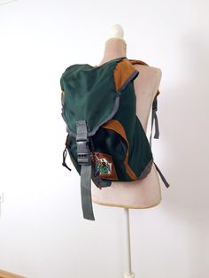 Vintage canvas backpack. Made in Austria around 1970. The backpack has been worn and is in very good condition. The front part is reinforced. It is waterproof. Single inner drawer Cord closure and flap closes with a clip. Front pocket with zipper. Adjustable shoulder strap lengths length 40 cm, 15.75 inches width 35 cm, 13.78 inch 70s Backpack, Small Rucksack, Hipster Backpack, Retro Backpack, Rucksack Bag, Flat Sketches, Vintage Backpacks, Vintage Canvas, Winter Night