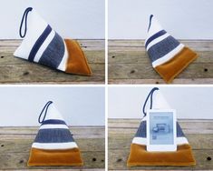 four different angles of a triangle shaped bag with an electronic device in the bottom right corner