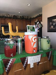 a football themed party with drinks and snacks