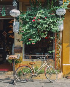 a bicycle parked in front of a store