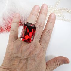 Huge Red Stone Ring, Ruby Crystal Ring, Light Siam ring Red Ring Huge Big Stone Cocktail Oversize rectangle Crystal Ruby Cherry True Red Men Adjustable Ring Statement Wedding Jewelry,Light Siam,SR84 This is a WOW bling ring! So big, sparkly but yet comfortable and adjustable made with top quality XXL (37mm x 25.5mm) rectangle octagon premium crystals . The setting is custom design for my studio, soldering and metal coating are done in Israel. This one is a real Head-turner! No one can ignore the Elegant Red Crystal Ring For Party, Red Open Ring Crystal Ring As Gift, Red Crystal Open Ring For Gift, Formal Ruby Ring With Rectangular Stone, Party Ruby Gemstone Rings, Ruby Rings With Rectangular Stone For Wedding, Rectangular Ruby Ring For Gift, Elegant Ruby Ring With Rectangular Stone, Rectangular Ruby Ring Gift