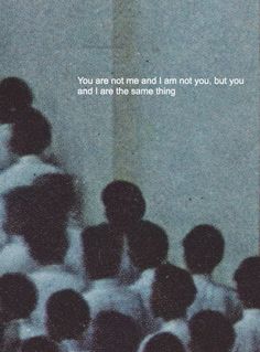 a group of people standing in front of a mirror with the words you are not me and i am not you, but you and i are the same thing