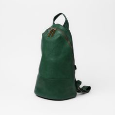 The Brennan Rucksack is a contemporary and compact alternative to the traditional backpack. Designed to sit snugly against the back and take up minimal space, it features a pair of adaptable straps that allow the bag to be worn across the body, or over one or both shoulders. About the 7 Hills Leather Collection - Local, Sustainable. Exceptional. Introducing the Seven Hills Collection. The story begins in Lynchburg, Virginia, known as the City of Seven Hills. Every hide in this collection was sou Outdoor Backpack With Detachable Strap, Standard Backpack With Detachable Strap, Green Backpack With Detachable Strap, Green Chest Bag For Everyday Use, Functional Green Leather Backpack With Adjustable Strap, Green Leather Backpack With Detachable Strap, Small Farms, Lynchburg Virginia, Luxury Leather Bag