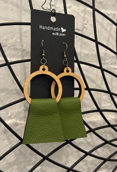 Stunning EcoBirch & Leather earrings!  Light color EcoBirch material and then green leather wrapped - adorned with bronze hardware.  Approx 3" drop **HANDMADE - handle me with care! Care Instructions: - Remove before showering & entering water - Keep away from moisture & harsh chemicals - Remove before working out/running - Remove before sleeping Green Leather Dangle Earrings, Green Leather Dangle Jewelry, Bronze Hardware, Green Leather, Leather Wraps, Leather Earrings, Wedding Shop, Jewelry Earrings Dangle, Etsy Earrings