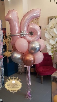 balloons are arranged in the shape of the number 50