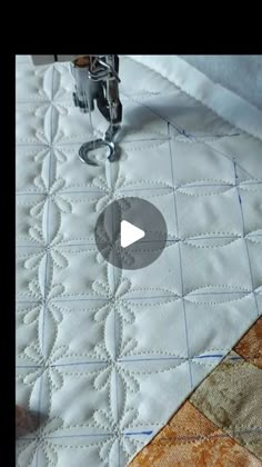 the video shows how to sew quilts with an old sewing machine and needle