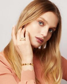 For a smooth and cultured style, choose the Gina Gold Chain Link Bracelet. Made with 14k gold-plated authentic sterling silver, the finish is one that shines with intensity. Chunky, oval-shaped links are connected with clear diamonette bedazzled bands to complete the look. With a double safety clasp to ensure it stays in place, this gorgeous piece exudes opulence for any occasion. By day, it adds a signature touch to your wardrobe while by night, it can bring out the elegance of any understated Elegant Oval Gold Chain Jewelry, Gold Oyster Bracelet Chain Fine Jewelry, Elegant Oval Gold Plated Chain Bracelet, Gold Plated Oval Gold Chain Jewelry, Elegant Oval Link Oyster Bracelet Jewelry, Gold-plated Oval Gold Chain Jewelry, Oval Gold-plated Gold Chain Jewelry, Gold Plated Oval Bracelet, Gold Plated Bracelet With Solid Link